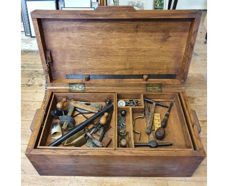 A carpenter's tool chest, with assorted tools, 83 cm wide 