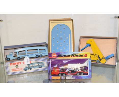 A Dinky Toys Pullmore car transporter, 982, boxed, a Dinky Toys elevator loader, 564, boxed, other model vehicles and a Chad 