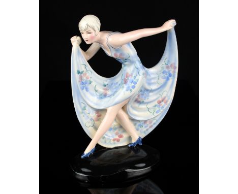 Lorenzl for Goldscheider ? an Art Deco figure of a female dancer in blue floral dress, model no. 6693, circa 1930, painted an