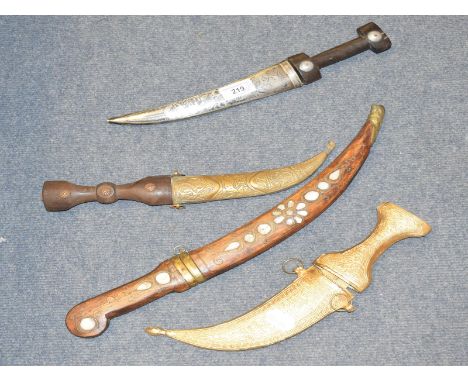 A military issue compass, Type P12, boxed, and a group of jambiya knives (box) 