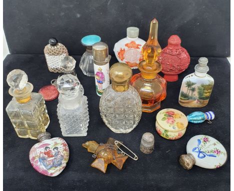 A Royal Worcester blush ivory pot and cover, and assorted scent bottles (qty) 