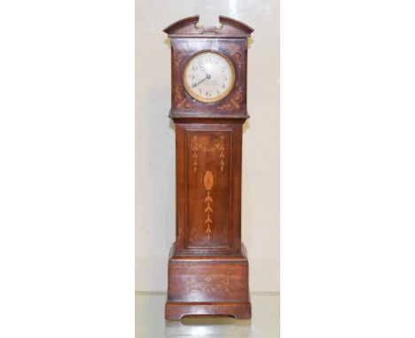 A late 19th/early 20th century Houghton & Gun, London, novelty clock in the form of a longcase, in an inlaid mahogany case, 3