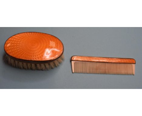 An early 20th century yellow metal and yellow enamel baby's brush and comb, in original box by Pearsons Limited 