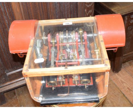 A working scale model engine, from a paddle steamer, 43 cm wide, in a case 