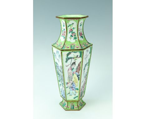 An early 20th Century Chinese Canton enamelled brass vase, of hexagonal baluster form with polychrome enamel decoration depic