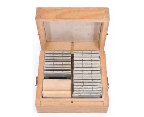 A cased set of German Third Reich army engineers instructional positive photographic glass slides depicting the construction 