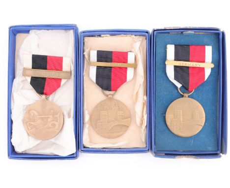 Three US Army of Occupation Medals, boxed