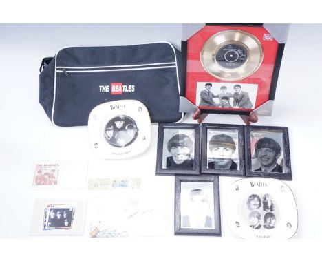 [The Beatles] A framed reproduction gold single "She Loves You" and band photograph, four printed mirrors, a reproduction She