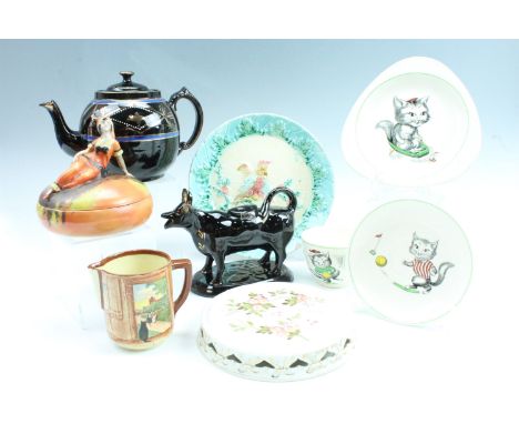 A 1930s dressing table lidded box, a Majolica parrot plate a/f, a cow creamer, a Copeland Spode Cutie Kitten trio (cup and pl