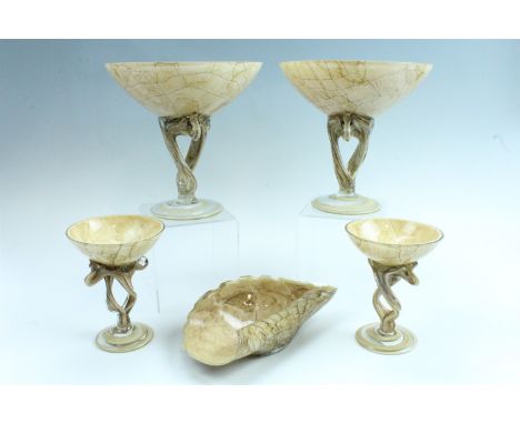 Two pairs of marble effect art glass tazzas and a conforming dish, tazzas 21.5 cm and 15 cm high