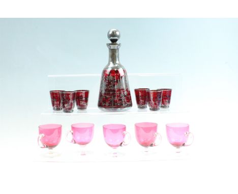 A 1930's silver overlaid liqueur set together with five ruby flashed custard cups