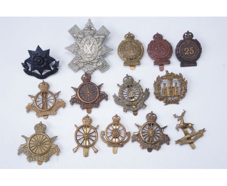 A collection of Army Cycle Corps and related cap badges