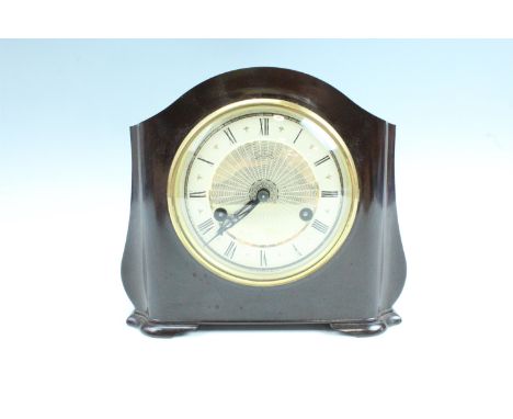 A Smith's Bakelite cased mantle clock, circa 1940s, striking on three coiled gongs, 18 cm high, (with key and pendulum, runni