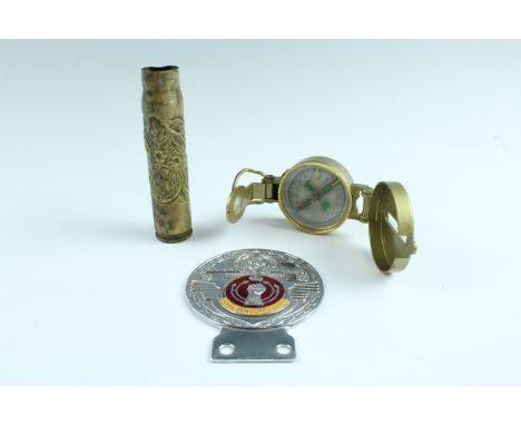 A pre-1953 Royal Armoured Corps bumper badge, together with a Kosovo campaign Sarajevo "trench art" cartridge case and a US A