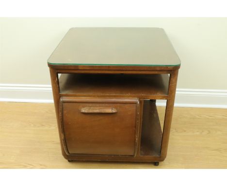 A 1930s Art Deco walnut veneered drinks cabinet by incorporall, having adorsed fall front cupboards, each fitted to hold glas