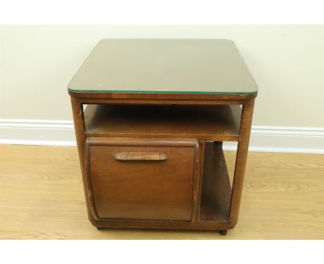 A 1930s Art Deco walnut veneered drinks cabinet by incorporall, having adorsed fall front cupboards, each fitted to hold glas