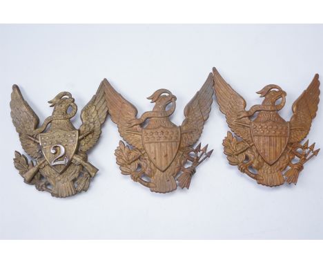 Three US Army Model 1881 helmet plates