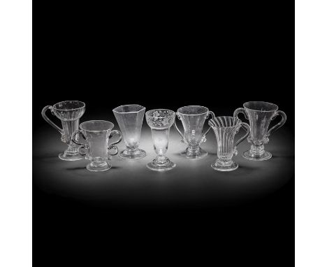 A collection of seven jelly and syllabub glasses, 18th centuryIn a variety of different forms, comprising one with a pan-topp