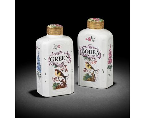A fine and rare pair of South Staffordshire enamelled opaque white glass tea bottles and enamel covers, circa 1755-60By the '