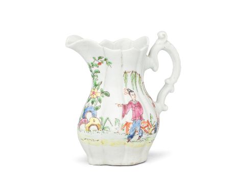 An early Worcester moulded cream jug, circa 1753-55Of finely lobed pear shape, with a double C-scroll handle with curled thum