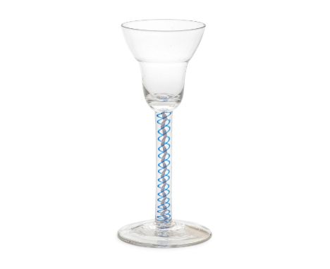 A rare blue colour twist wine glass, circa 1765The pan-topped bowl on a stem containing a undulating opaque white spiral core