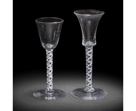Two good mixed twist wine glasses, circa 1765One with a waisted bucket bowl and the other with a round funnel bowl, the stems