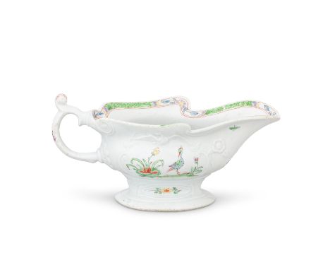 A small Worcester sauceboat, circa 1752-53Of high-footed form and attractive small size, the scroll handle with a high thumbr