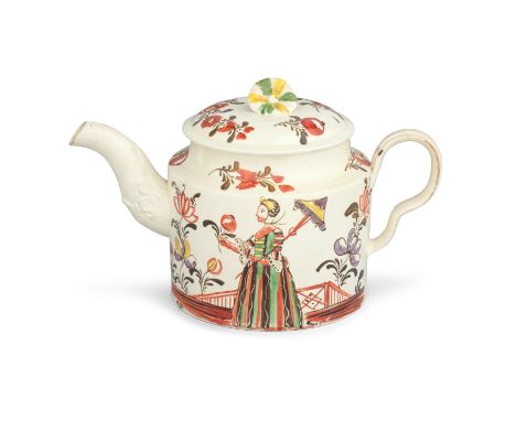 A creamware teapot and cover, circa 1770-75Probably Yorkshire, of cylindrical form with an ear-shaped handle and leaf moulded
