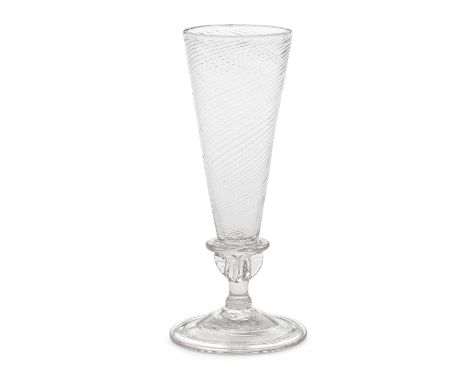 A propeller-knopped 'wrythen ale' glass, first quarter 18th centuryThe tall wrythen-moulded conical bowl set on a wide collar