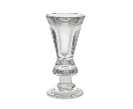 A very rare deceptive drop-knopped heavy baluster dram or toastmaster's glass, circa 1710The tall thick-walled conical bowl s