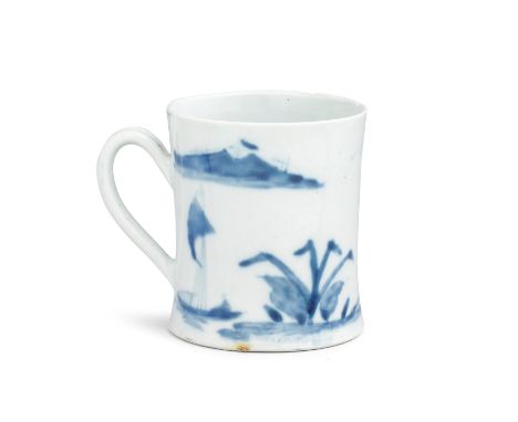 A Worcester small mug or coffee can, circa 1753-54Of 'Scratch Cross' type with a grooved handle, the gently waisted form pain