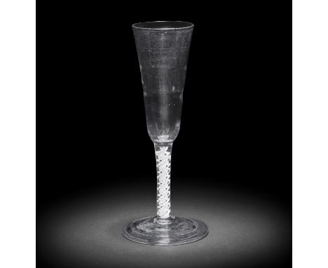 A very rare 'Lynn' ale glass, circa 1765The tall round funnel bowl moulded with two concentric rings, the double-series stem 