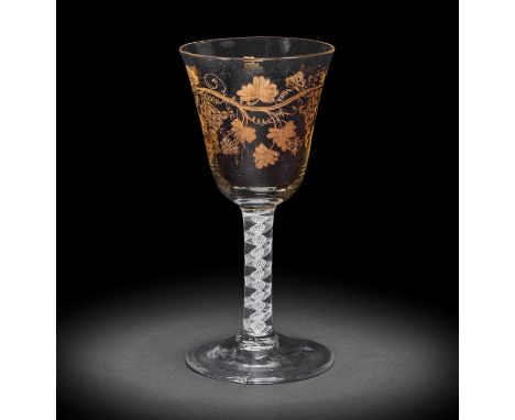 A Giles gilded opaque twist goblet, circa 1765-70Decorated in the London workshop of James Giles, the generous round funnel b