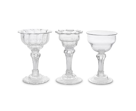 Three good moulded stem sweetmeat glasses, circa 1740-50With lipped double-ogee bowls set on eight-sided teared pedestal stem