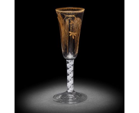 A Giles gilded opaque twist ale glass, circa 1765The tall round funnel bowl gilt with crossed ears of barley in the London wo