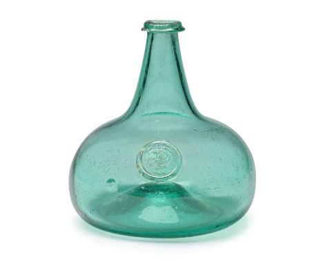 A very rare sealed 'Onion' wine bottle, dated 1725In pale aqua-green glass, the rounded bulbous body with a tapering neck app