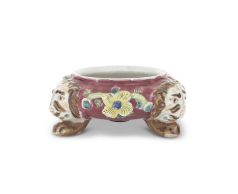 An exceptionally rare coloured Limehouse salt, circa 1746-48Of circular form moulded with three floral sprays in high-relief,