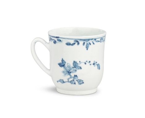 A rare Worcester coffee cup, circa 1754Of 'scratch cross' type with a grooved handle, painted in pale blue with Chinese flora