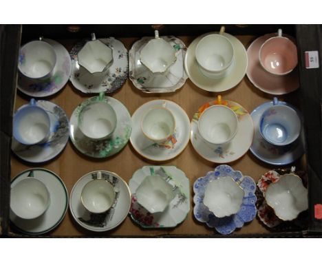 A collection of Shelley and other porcelain tea cups and saucers in various patterns (15)