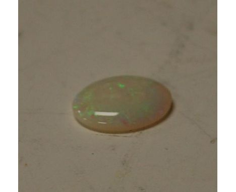 An Australian loose cabochon opal, gross weight approx 5ct