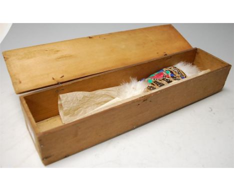 A Victorian faux ivory and feather fan in a pine box
