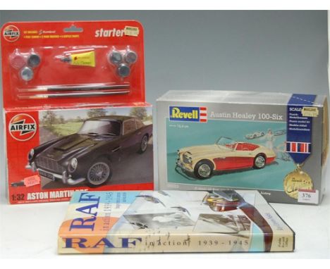 A boxed Airfix 1.32 scale model of an Aston Martin DB5 and another of an Austin Healy and a book of the RAF in Action 1939-45