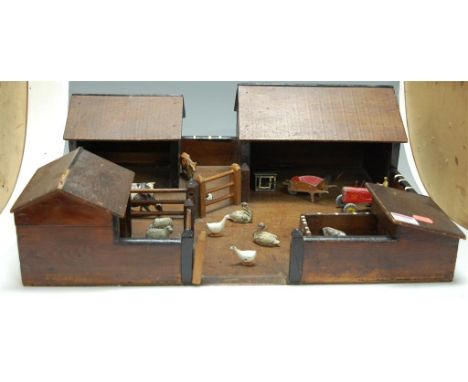 A model wooden farm yard together with various playworn diecast toy vehicles to include Dinky toys and Massey Harris tractor,