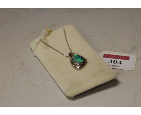 A sterling silver and doublet opal set pendant on fine link neckchain 