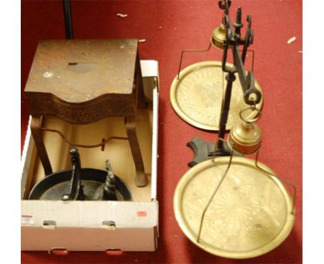 A pair of large iron and brass balance scales together with a steel footman and cast iron boot scraper etc