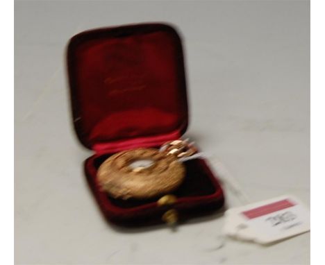A circa 1900 ladies 14ct gold half hunter fob watch by Tiffany & Co. having finely engraved and enamel set case, keyless move