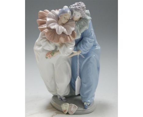 A large Lladro figure of clowns, impressed verso 5658, height 27.5cm, boxed