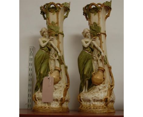 F. Otto for Royal Dux - A pair of large Art Nouveau figural vases, circa 1900, modelled in the form of two female figures bes