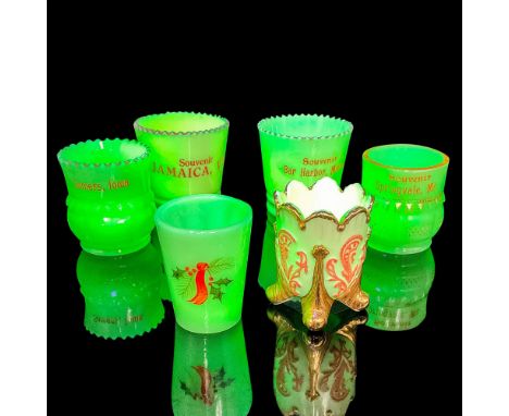 Fantastic collection of small milk glass containers in various shades of light green that glow under UV light. Many of the gl