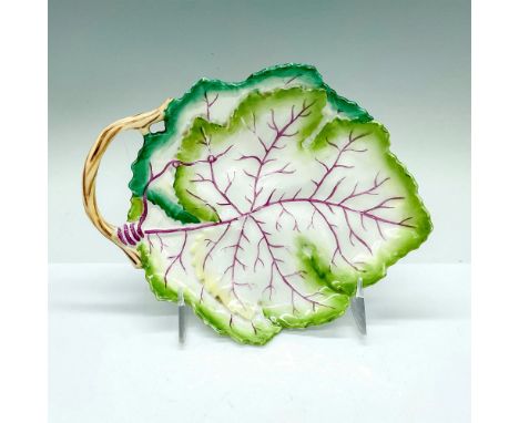 A leaf shaped tray with painted green edge, and purple center. Royal Worcester backstamp. Model number: 3628. Issued: 1898Dim